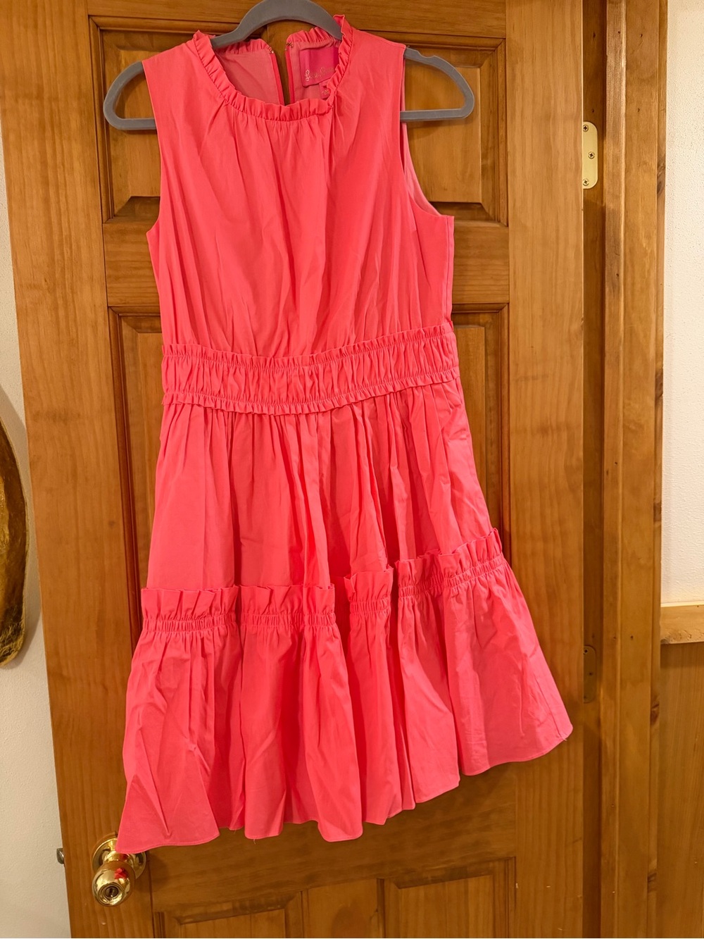Woman’s Sleeveless Ruffle Tiered Dress in Coral Pink